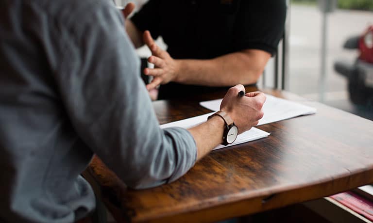 Mistrust at work can begin as early as the job interview.